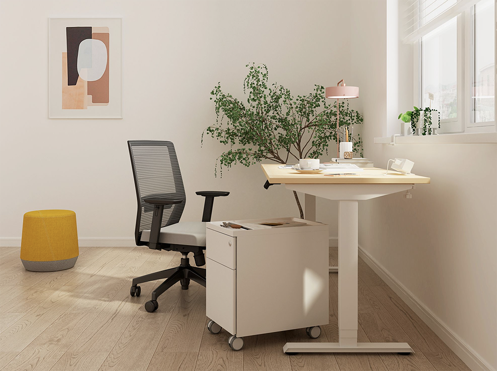 Vektor Office Chair shown in a home office with a standing desk and mobile pedestal